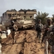 RAMADI, IRAQ - JANUARY 16:  Iraqi Army troops patrol with U.S. soldiers from B Company, 1st Battalion, 26th Infantry Regiment through Ramadi January 16, 2007 in Iraq's Anbar province. Ramadi, with daily fighting between American forces and insurgents, has one of the highest casualty rates in Iraq.  (Photo by John Moore/Getty Images)